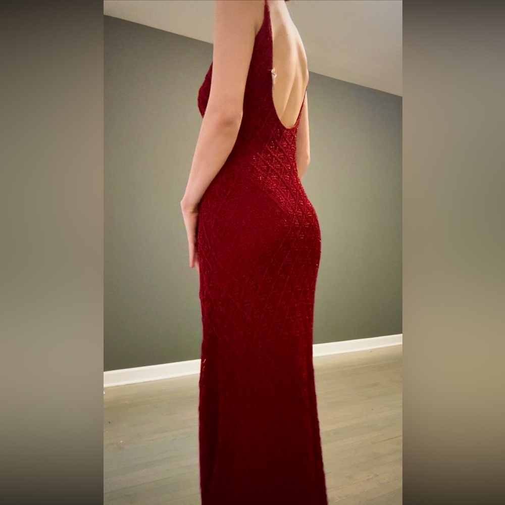 Red floor length Carmen Marc Valvo gown